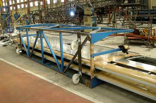 El carro transportador, volcado