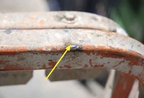 Punto de contacto de la línea con la barandilla